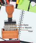 Kickin Retro Wooden Roller Date Stamp With Sleek Grip And Clean Roll On Ink System Delivers Flawless Calendar Marks From 2026 To 2036 on a desk with stationery.