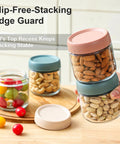 Hand holding stacked Six Pack 10oz Glass Jars with Airtight Lids for snacks and storage, highlighting stability and stacking feature.