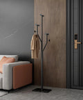 Heavy-Duty Freestanding Coat Rack With Tree-Shaped Metal Design And Marble Base, Corner Clothing Rack in a modern living room