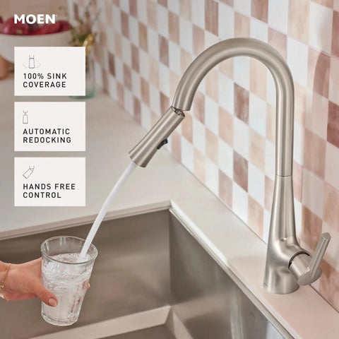 Top Shelf Pulldown Kitchen Faucet In Slick Spot Resist Stainless Steel with 360 swivel spray wand in action pouring water.
