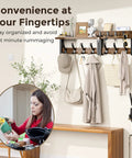 29 Inch Wall Mounted Coat Rack with Swanky Shelf and Heavy Duty Hooks for Entryway Organization Brown Storage Holder for Coats Bags Hats and Mail with hats and bags displayed.