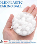 Fifty Piece 12mm Pom Plastic Bearing Balls Built For Slick Performance And Zero Friction Glide To Make Drawer Repairs A Cinch While Keeping Heavy Loads Rolling Smoothly in a hand.