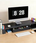 Dual Monitor Stand Riser With Drawer And Pen Holders Desk Organizer And Book Racks For Office Desk Accessories Boss Level Workspace Organizer For Two Monitors In Black, shown with one monitor on desk, books, and stationery items organized.