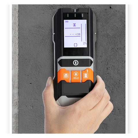 Straight Up Smooth Wall Scanner Featuring No Sweat Stud Detection And Deep Metal Sensor For Total DIY Home Repairs Plus Quick AC Voltage Tracking And Precision Moisture Measurement For Any Gig Project held against a wall, showcasing the display screen.