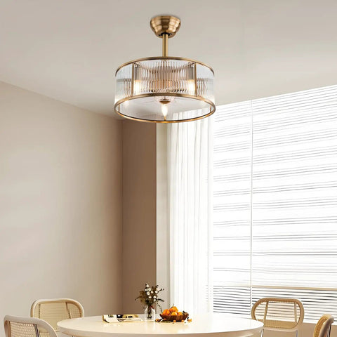 Vintage Industrial Caged Ceiling Fan Light Fixture with Remote,7-Blade Fan in gold finish, featuring a glass enclosure, above a dining table.