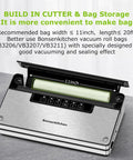 Stainless Steel Vacuum Sealer Machine With Built In Cutter And Bag Storage on kitchen counter, lid open showing roll storage.