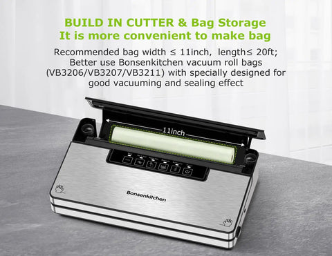 Stainless Steel Vacuum Sealer Machine With Built In Cutter And Bag Storage on kitchen counter, lid open showing roll storage.
