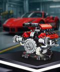 V8 Engine Model Kit With 8 Cylinder Visible Engine, LED Lights, Motor, And App Control displayed on a platform with a car backdrop