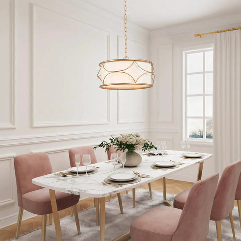 Gold Drum Pendant Chandelier Light Fixture With White Fabric Shade above dining table, 4 light modern chandelier in elegant room.