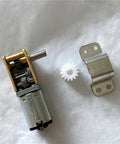 N20 Right Angle DC Gear Motor for Robot Projects Featuring 3V 6V And 12V With Stable 15 To 120 RPM Worm Drive showing gear mechanism and metal bracket.