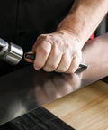 Heavy Duty Built To Last Pro Grade 16 Piece Punch And Chisel Set With Roll Pouch in use on metal surface by hand