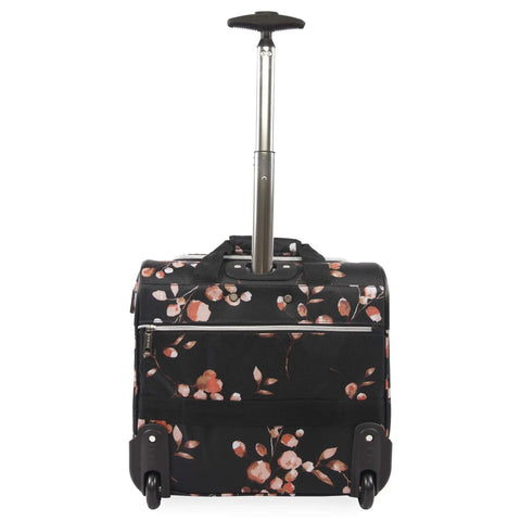 Valentina Underseat Wheeled Carry On Luggage With Floral Branch Design, black with pink flowers, showing push button handle and inline wheels