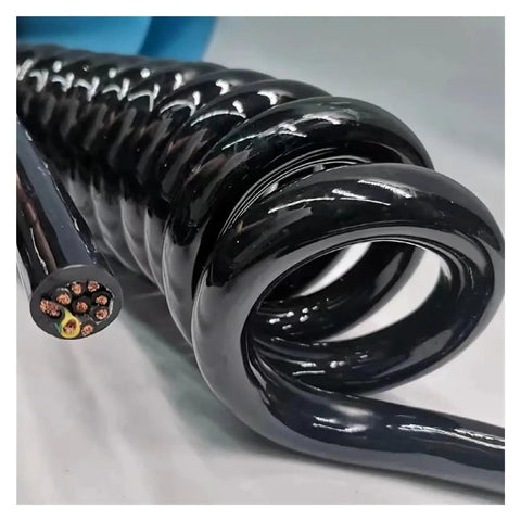 Built Rugged Retractable Spiral Coil Cord With Telescopic Spring Extension Cable, black coiled design showing 18 cores in heavy-duty use.
