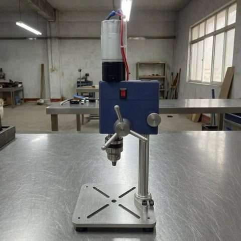 Bothyi Miniature Desktop Drill Press Workbench Tool Vertical Precision Boring Compact Footprint Stable Base Metal Housing on workbench.