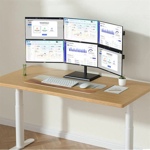 Dual Monitor Arm Mount With Smooth As Butter Articulation Full Extension Swivel Tilt Rotation Height Adjustable Heavy Duty Steel Desk Stand Ergonomic Desktop Setup For 17 To 32 Inch Screens Built Like A Tank with four monitors on a wooden desk.