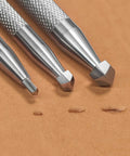Double Beveler Stamp Set For Leathercraft, 3 Piece Pro Grade Stainless Steel Bevelers with 6mm, 4mm, and 2mm tips on leather surface.