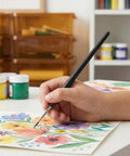 Hella Versatile 6 Piece Foam Painting Roller And Detail Brush Set For Art Projects Washable Craft Supplies That Make Creating With Crafters A Ridiculous Breeze Today, detail brush in hand painting colorful flowers.