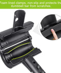 Turn Your Dumbbells Into A Barbell With This Adjustable EZ Curl Bar Adapter showing foam lined clamps for scratch protection