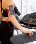Person using treadmill with Two Pack Universal Treadmill Magnetic Safety Keys Round Emergency Stop Magnets Replacement for workouts