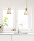 Gold Pendant Light Fixture For Kitchen Island And Dining Room, Brass Hanging Light With Bubble Seeded Glass over white counter