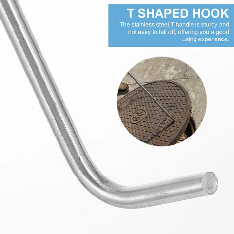 Close-up of Heavy Duty Stainless Steel Manhole Cover Hook With Sturdy T Shaped Handle Design, lifting a sewer grate.