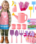 Child holding a trowel in a pink kids gardening tools set with rake, shovel, trowel, watering can, gloves, apron, tote, plant pots, bookmark kits.