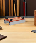 Tough Aluminum Router Table Insert Plate Dead Center Alignment Tight Grip Locks No Sweat Mounting For The Woodshop Crew Flawless Routing Performance Guaranteed on a workbench.