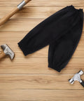 Heavy Duty Waterproof Pu Arm Sleeves Knock Grease Out Of Your Daily Hustle And Keep Your Duds Spotless With A Flex Grip Design on wood surface next to hammers.