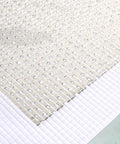Close-up of Self Adhesive Drywall Patch 4x4 Inch Aluminum Mesh Patch Kit for Walls Furniture Ceilings and Doors Instant Quick Fix