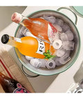 Hassle Free Countertop Ice Maker With Small And Large Cube Options For Campouts Tailgates And Home Bars Delivers Legit Cold Chill On The Fly In A Super Tight Footprint For Party Crews with drinks in ice.