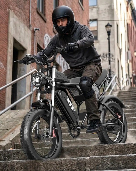 Person riding Offroad 1500W Peak Motor Fat Tire Electric Bike With 30 MPH Top Speed, 48V 15.6Ah Removable Battery down stairs