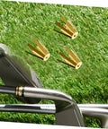 Universal Brass Golf Shaft Adapter Shims And Octopus Spacers Rig Ready Pack Of Five Durable Fittings displayed on grass near golf clubs.