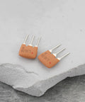 Two ceramic IF filters from the 10 Pack Ceramic IF Filter SFE 10.7MA For FM Radio And Wireless Communication Gear Analog Signal Processing.