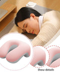 Woman using Desk Nap Pillow With Memory Foam Neck Support, Breathable Removable Cover, Versatile Headrest in pink and white.