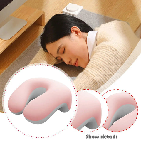 Woman using Desk Nap Pillow With Memory Foam Neck Support, Breathable Removable Cover, Versatile Headrest in pink and white.