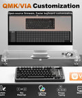 Compact 75 Percent Mechanical Keyboard Featuring Customizable LCD Screen And Rock Solid Volume Knob Equipped With Super Smooth Candy Switches For Seamless PC Gaming And Daily Grind Typing on a transparent desk with monitor.