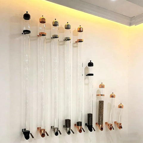Wall Mounted Coffee Bean Dispenser With Adjustable Pour Spout And Airtight Lid keeps dry goods in clear borosilicate glass tubes.