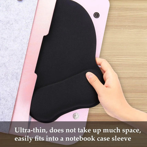 Hand placing ergonomic mouse pad with wrist rest memory foam for computer, home office and gaming into pink notebook case.