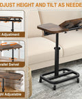 Go-To Large Size Portable Laptop Rolling Desk with wheels, adjustable height and tilt top, shown in ergonomic home setting.