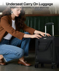 Woman with underseat carry-on luggage 16 inch softside spinner.