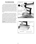 Heavy Hitter Table Saw Dust Collection Guard mounted with adjustable weight, 2-1/2" dust hose, and suspension arm for blade alignment.