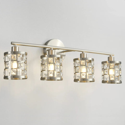 Four Light Brushed Nickel Vanity Light Over Mirror With Cylinder Crystal Shades, sleek modern wall sconces on white wall