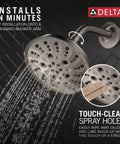 Universal Showering Components Showerhead With Lumicoat Stainless Finish spraying water in a bathroom with touch-clean spray holes