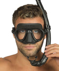 Person wearing the Calibro And Corsica Dive Mask Set In Blue, Pro Grade Italian Craft For Freediving And Scuba with snorkel attachment.