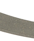 Close-up of OEM Drum Slide Glide Pad For Dryers Front Drum Support Replacement Part, gray with hole and notch, angled view.