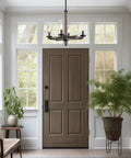 Alden 18 Inch 4 Light Modern Farmhouse Chandelier With Clear Cylinder Glass Shades Gray Oak Wood Finish And Black Accents For Dining Room Or Living Space To Elevate Your Vibe Ceiling Light Fixture hanging in an entryway