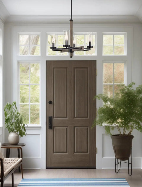 Alden 18 Inch 4 Light Modern Farmhouse Chandelier With Clear Cylinder Glass Shades Gray Oak Wood Finish And Black Accents For Dining Room Or Living Space To Elevate Your Vibe Ceiling Light Fixture hanging in an entryway