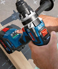 18V Cordless Combi Drill with 150 Nm Torque Brushless Motor Pro Grade Power Tool in use on wooden plank