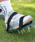 Adjustable Lawn Aerator Shoes With 13 Heavy Nails For Quick Lawn Aeration, spiked sandals on foot on grassy lawn.