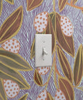 Top Shelf Hand Drawn Botanical Vinyl Wallpaper Featuring Subtle Leather Texture Hella Durable Commercial Wallcoverings Custom Printed Fresh On Demand with light switch.
